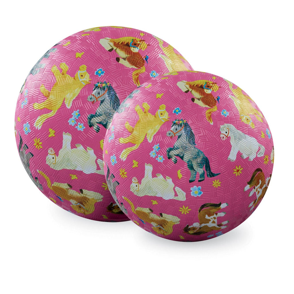 Two pink balls with poney l illustrations on a white background
