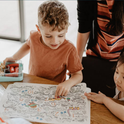 Hey Doodle DinoRoar Colouring mat, with boy and girl.