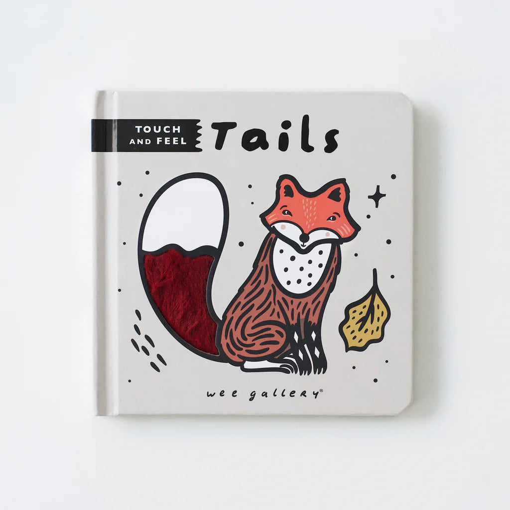 Children's book titled 'Tails' with a fox illustration on a white background