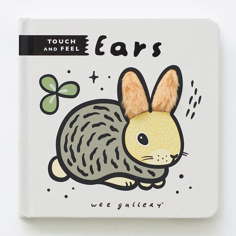 Children's book titled 'Ears' with a rabbit illustration on a white background
